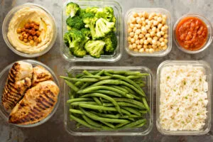 Refrigerator organized with stacked weekly meal portions